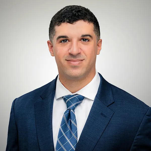 Daniel Ruzi, Associate